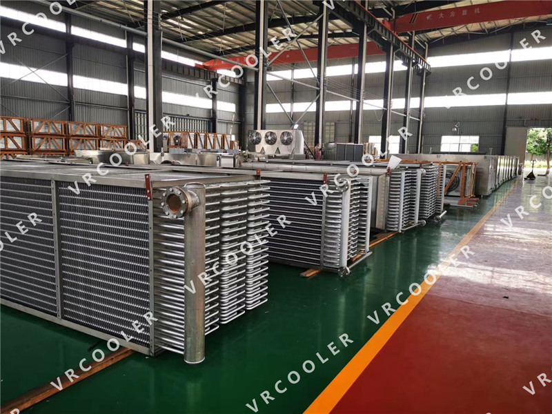 What are the most common refrigerants used in IQF evaporator coils